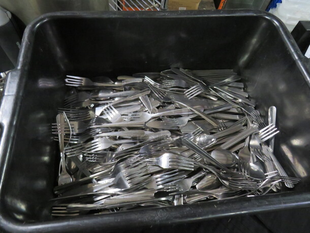 One Black Bussing Tub With Lid And Full Of Assorted Flatware.