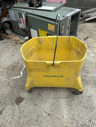 One Mop Bucket On Casters.