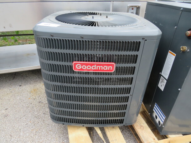 One Goodman 2 Ton Straight A/C Condenser. 208-230 Volt. 1 Phase. #GSX140241LD. 27X26X25