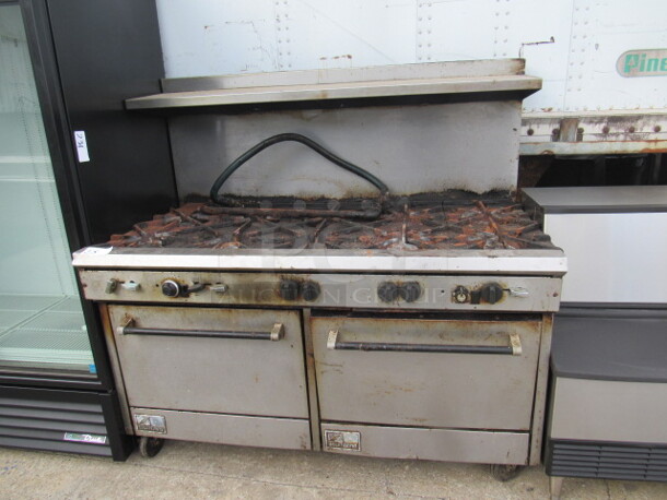One Southbend 10 Burner Natural Gas Range, With Over Shelf On Casters. 60X35X60