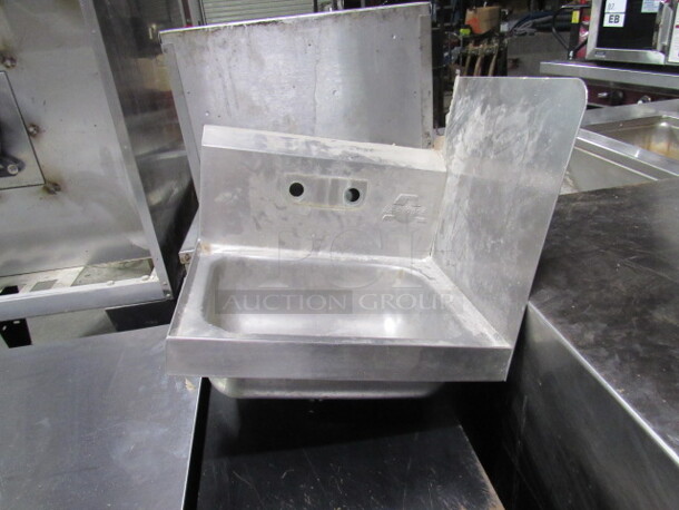 One 17X15 Stainless Steel Advance Tabco Hand Sink With Back Splash And Right Side Splash.