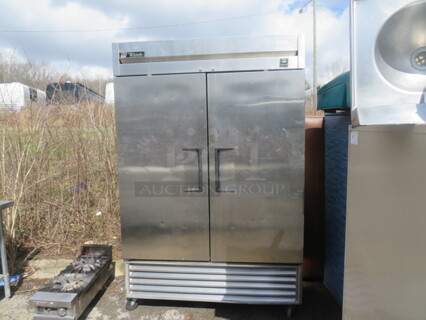 One SS True 2 Door Freezer On Casters. Model# TS-49F. 115 Volt. 54X30X83