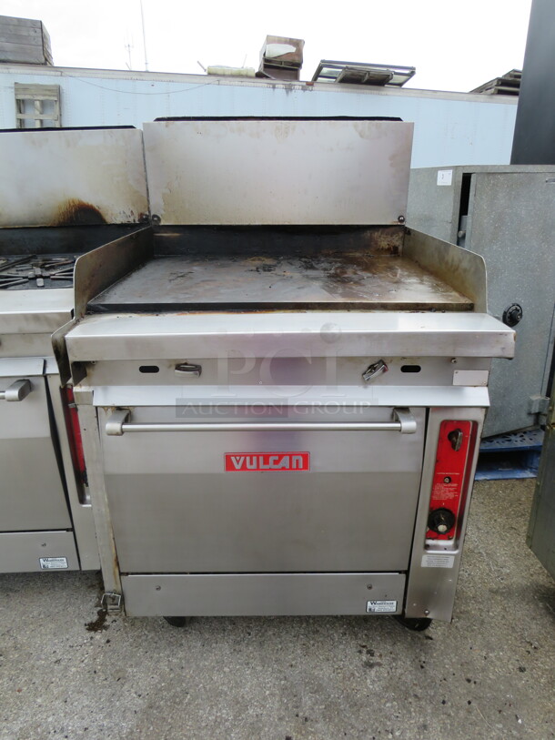 One WORKING Vulcan Natural Gas Griddle Range On Casters. 34X39X54 - Image 1 of 2