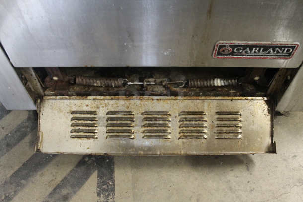 Garland Stainless Steel Commercial Electric Powered Flat Top Griddle w/ Thermostatic Controls, 2 Left Side Burners, Oven, Over Shelf and Back Splash. 208 Volts, 3 Phase. - Image 7 of 9