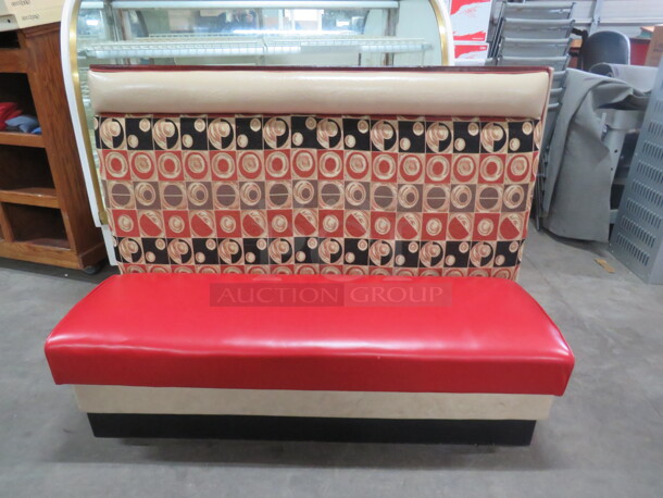 One Single Sided Booth With Red Cushioned Seat And Multi Color Cushioned Back.  - Image 1 of 2