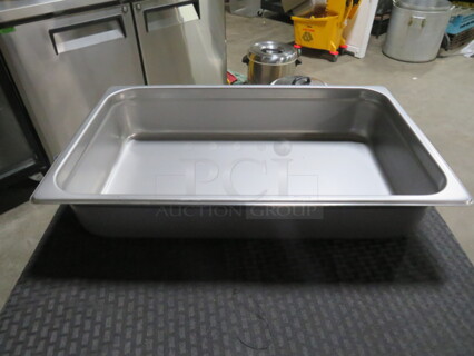 One Full Size 4 Inch Deep Hotel Pan.