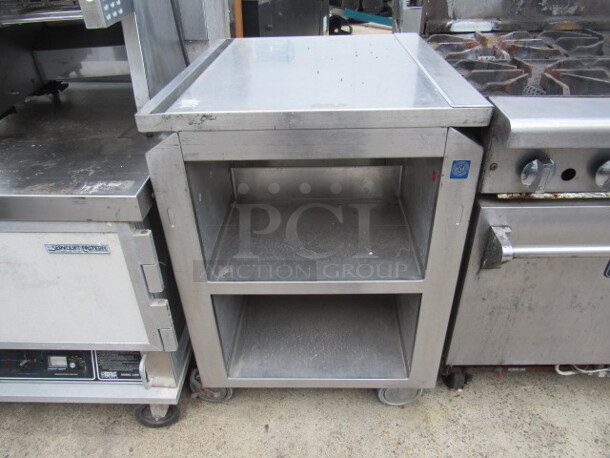 One Stainless Steel Portable Table With A Handle, 2 Stainless Under Shelves On Casters. 24X28X35.5 - Image 1 of 1