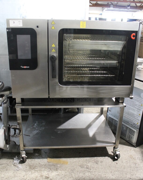 Convotherm C4eT 6.20 GS - N Stainless Steel Commercial Natural Gas Powered Combination Convection Oven on Stainless Steel Equipment Stand w/ Commercial Casters. 68,200 BTU. - Image 1 of 10