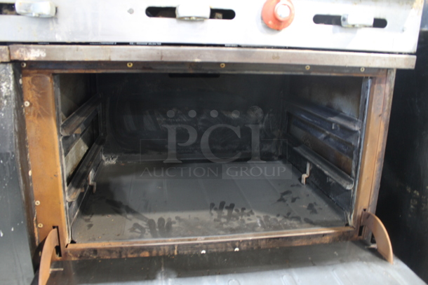 Vulcan 60FL77R Metal Commercial Natural Gas Powered 6 Burner Range w/ Right Side Flat Top Griddle, 2 Ovens, Over Shelf and Back Splash. - Image 6 of 8