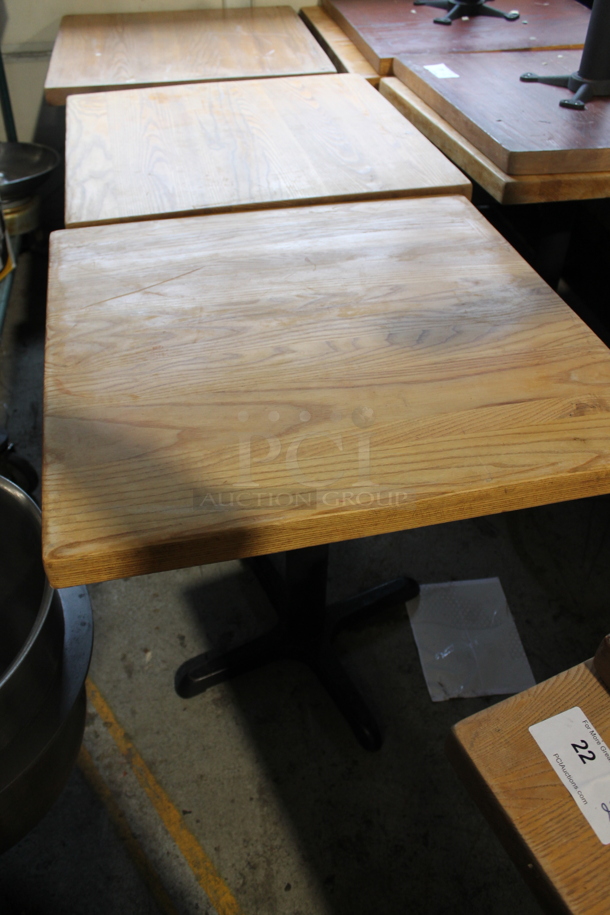 2 Wooden Dining Height Tables on Black Metal Table Base. 2 Times Your Bid! - Image 1 of 4