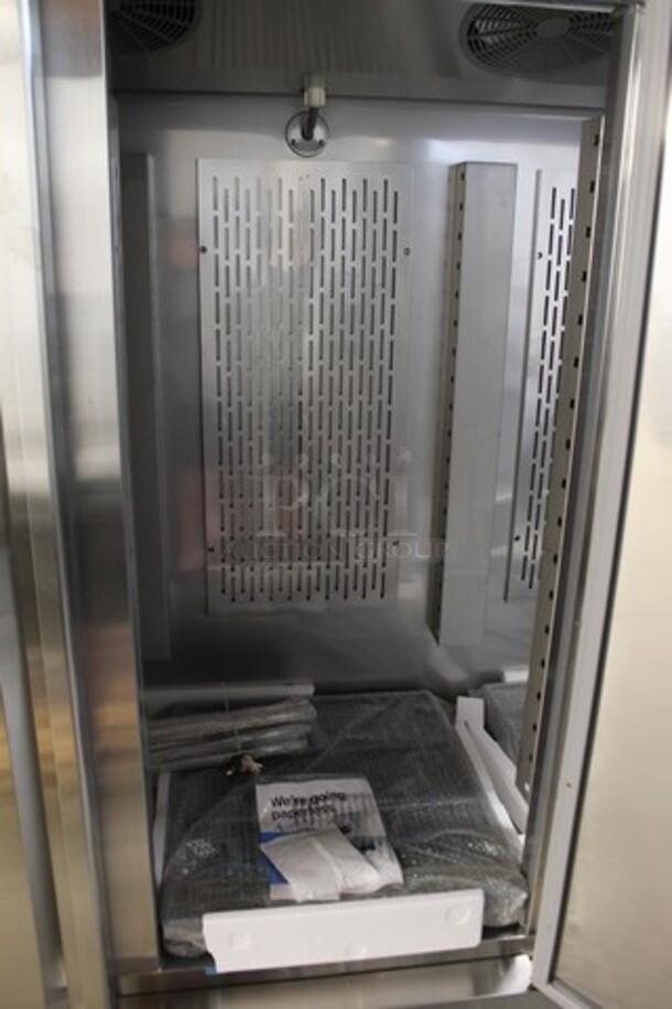 BRAND NEW SCRATCH AND DENT! 2023 Avantco 178SS3RHC Stainless Steel Commercial 3 Door Reach In Cooler Merchandiser w/ Poly Coated Racks on Commercial Casters. 115 Volts, 1 Phase. Tested and Working! - Image 5 of 7
