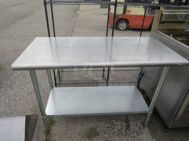 One Stainless Steel Table With Under Shelf. 48X24X34