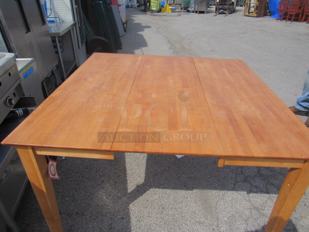 One NEW Wooden Table With Leaf. 54X36X36. With Leaf 54X54X36. Assembly Required. - Image 6 of 6