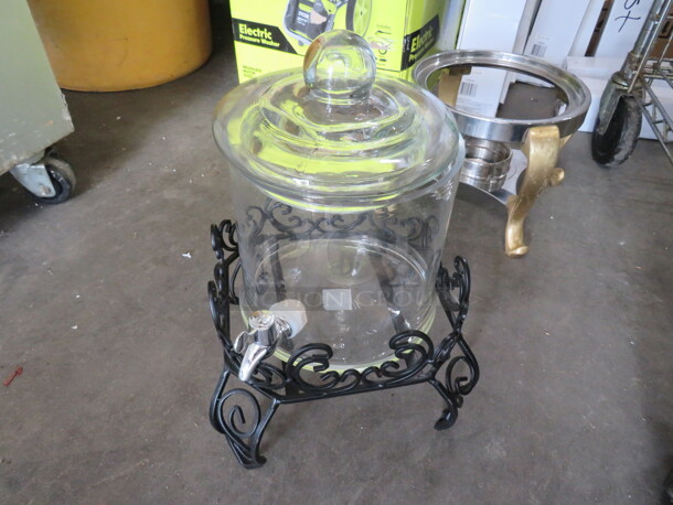 One Glass Beverage Dispenser With Black Metal Stand. - Image 1 of 1