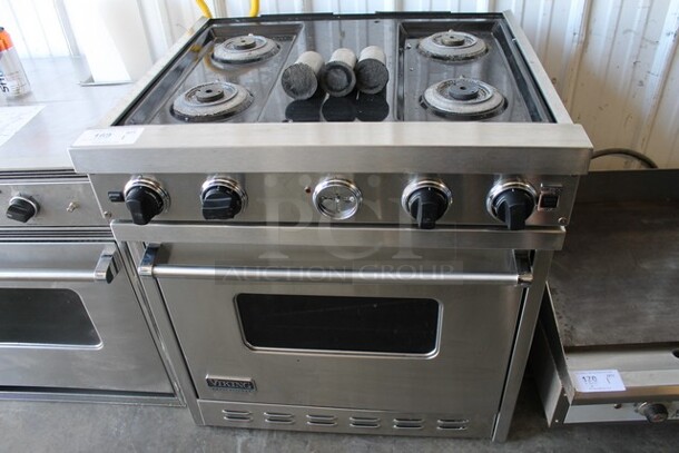 Viking Stainless Steel Gas Powered 4 Burner Range w/ Oven. 