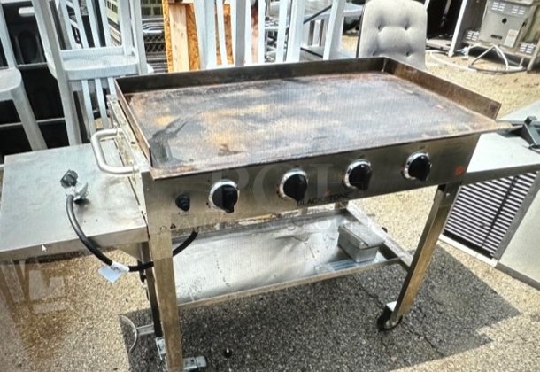 One Blackstone 36 Inch Propane Portable Griddle On Casters. Model# 1560. 62X22X35.