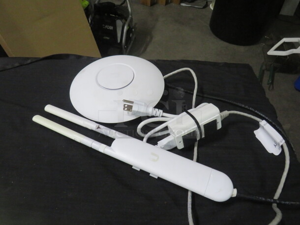 One Unifi Dual Band Wifi 5 Access Point.
