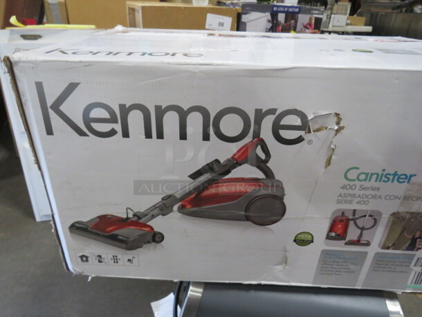 One Kenmore Cannister Vacuum.