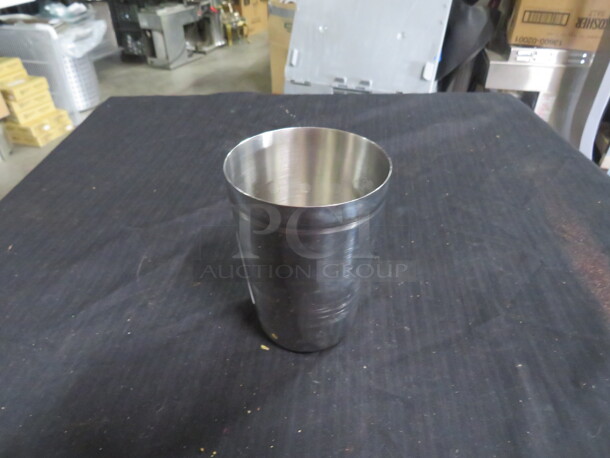 One Stainless Steel Mixing Glass. 