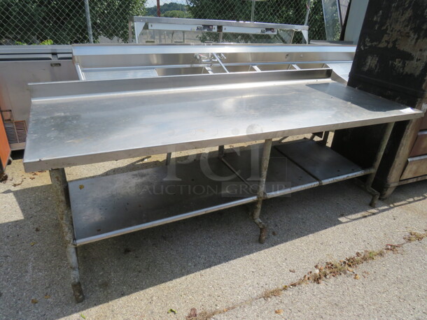 One Stainless Steel Table With Stainless Steel Under Shelf. 96X36X37