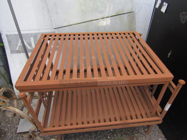 One Brown Metal Side Table/Plant Stand. 24X18X11.5 - Image 1 of 1