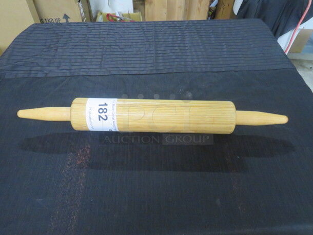 One Wooden Rolling Pin.