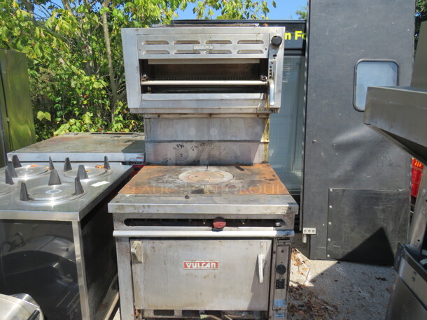 One Natural Gas Vulcan Griddle Range With Overhead Salamander, With 1 Rack On Casters. Missing Knobs Bottom Panel, And Door Handle. 36X38X72