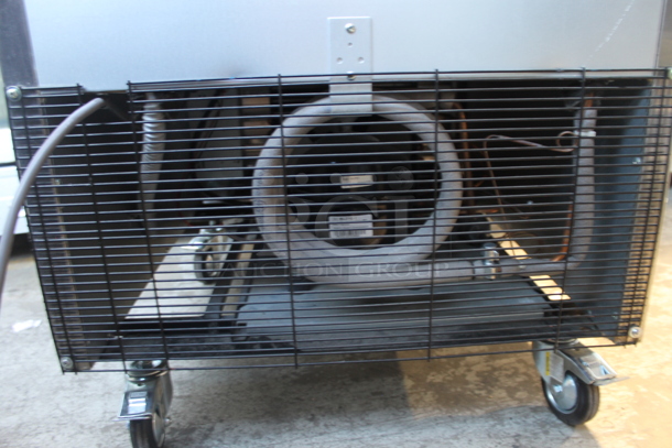 Turbo Air TSR-23SD Stainless Steel Commercial Single Door Reach In Cooler w/ Poly Coated Racks on Commercial Casters. 110-120 Volts, 1 Phase. Tested and Powers On But Does Not Get Cold - Image 4 of 6