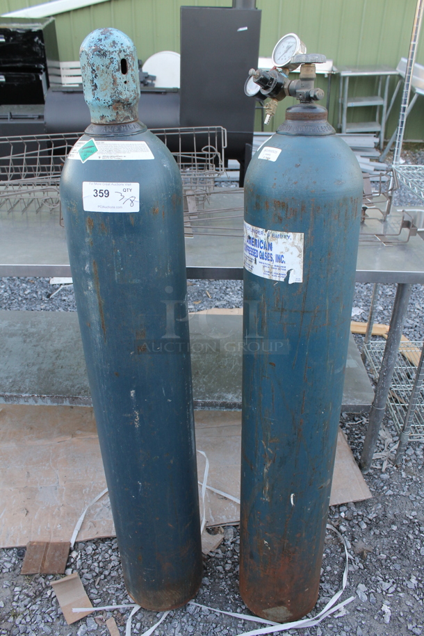 2 Metal Compressed Gas Tanks. 2 Times Your Bid! Buyer Must Pick Up - We Will Not Ship This Item