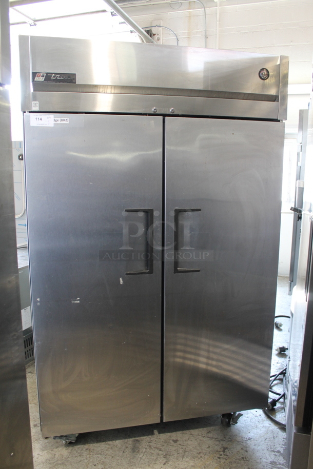 2015 True TG2R-2S Stainless Steel Commercial 2 Door Reach In Cooler w/ Poly Coated Racks on Commercial Casters. Tested and Powers On But Does Not Get Cold - Image 1 of 6
