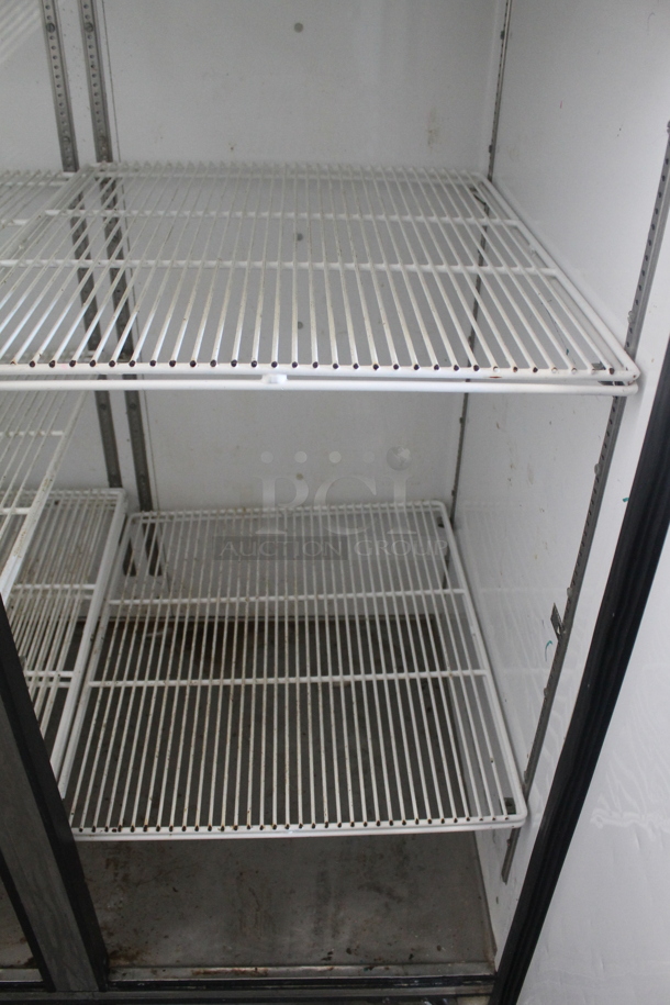 2014 True TG2R-2S ENERGY STAR Stainless Steel Commercial 2 Door Reach In Cooler w/ Poly Coated Racks on Commercial Casters. 115 Volts, 1 Phase. Tested and Working! - Image 5 of 7