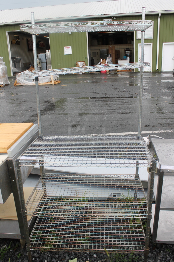 Chrome Finish 5 Tier Wire Shelving Unit. BUYER MUST DISMANTLE. PCI CANNOT DISMANTLE FOR SHIPPING. PLEASE CONSIDER FREIGHT CHARGES.
 - Image 1 of 3