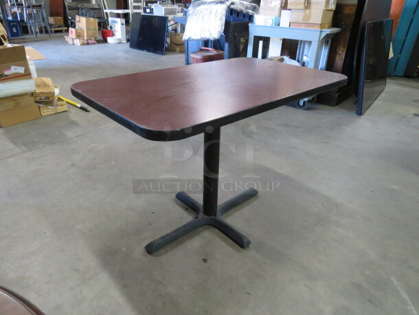 One Brown Laminate Table Top On A Pedestal Base. 42X30X29 - Image 1 of 1