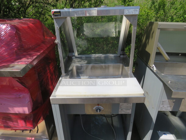 One Duke Hot Well With Sneeze Guard, Cutting Board, And Under Storage. Model# SWH600-25FLM. 120 Volt. 25X34X57 - Image 1 of 3