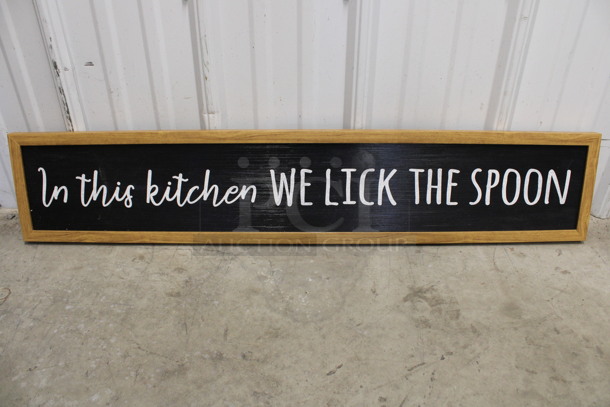 Wooden Framed In This Kitchen We Lick The Spoon Sign. 37.5x1x7.5