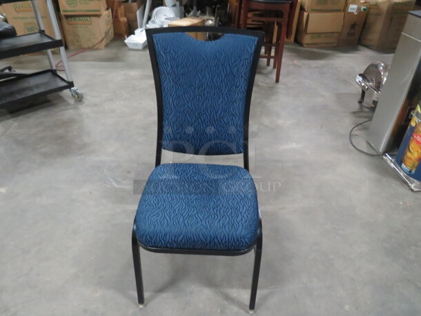 Black Metal Banquet Stacking Chair With Blue/Black Cushioned Seat And Back. 4XBID - Image 1 of 3