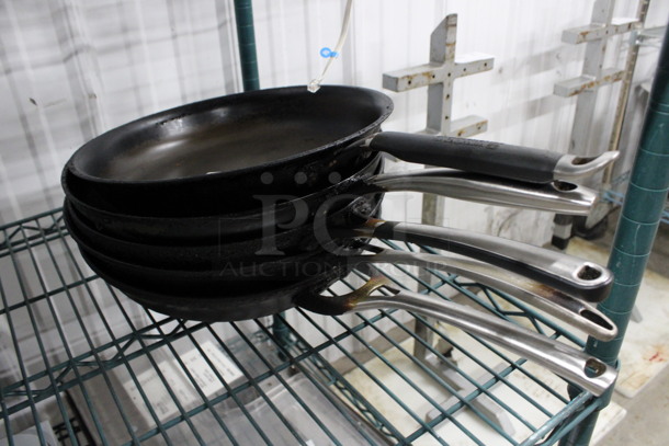 5 Various Metal Skillets. Includes 20.5x12.5x2. 5 Times Your Bid!