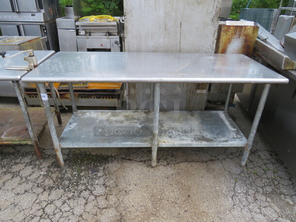 One Stainless Steel Table With Under Shelf, And 10lb Can Opener. 72X30X35 - Image 1 of 1