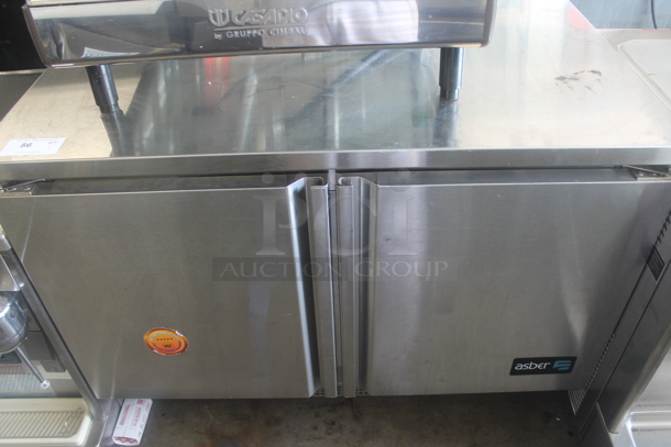 Asber AUTR 48 Stainless Steel Commercial 2 Door Undercounter Cooler on Commercial Casters. 115 Volts, 1 Phase. Tested and Powers On But Does Not Get Cold - Image 1 of 8