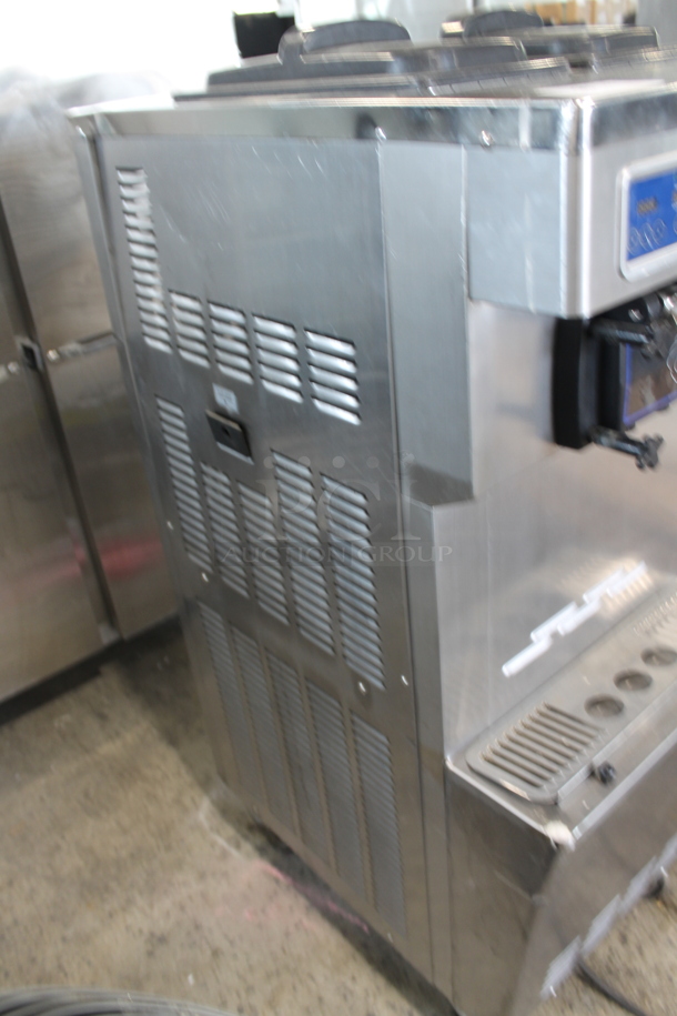 SSI-203S Stainless Steel Commercial Air Cooled Floor Style 2 Flavor w/ Twist Soft Serve Ice Cream Machine on Commercial Casters. 220 Volts, 1 Phase. - Image 8 of 11