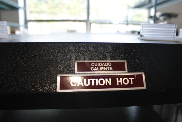 Metal Commercial Floor Style Electric Powered Heated 2 Tier Merchandiser on Commercial Casters. - Image 7 of 7