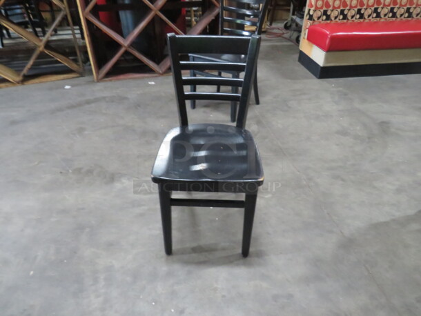 Black Wooden Chair. 4XBID - Image 1 of 1