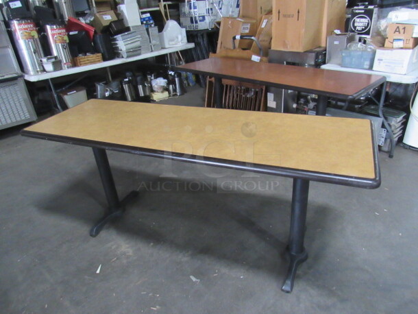 One Beige Table Top On Dual Pedestal Bases. 72X24X30