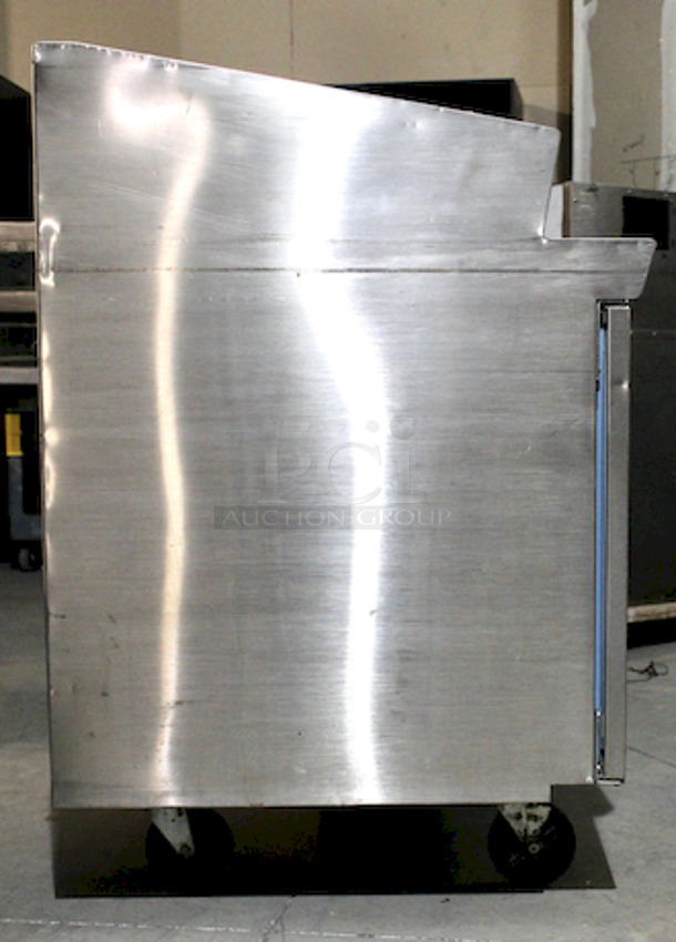NICE! Delfield  70” PTB Pizza Prep Table With Mega Top, Self Contained Refrigerated Base With 27.12” DP, Bloomington Cold Rail & Template.
Tested - In Working Order.
115v/60hz/1ph/12.0A   - Image 3 of 7