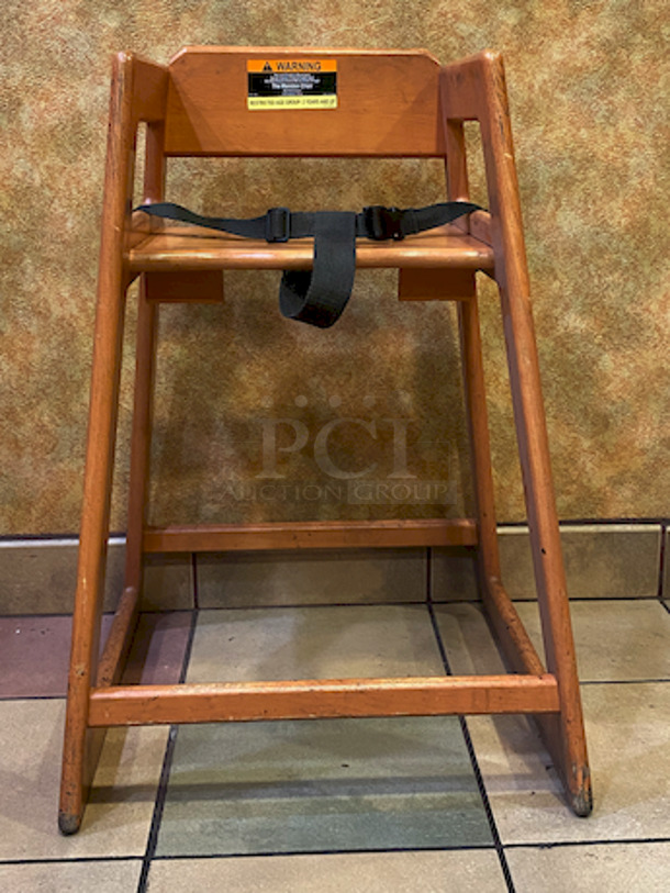 BEAUTIFUL! Tomlinson The Marston C-30 High Chair.
 Depth: 19" (483 mm), Height: 29" (737 mm), Width: 18" (457 mm) Height to seat: 21" (533 mm), Height to arm: 26-3/4" (679 mm)
Solid 3/4" oak high chairs with mortise and tenon frame construction and large contoured seat. Instant-release safety straps with crotch strap. Radius edges keep food from collecting. High chairs easily stack and store. - Image 1 of 4