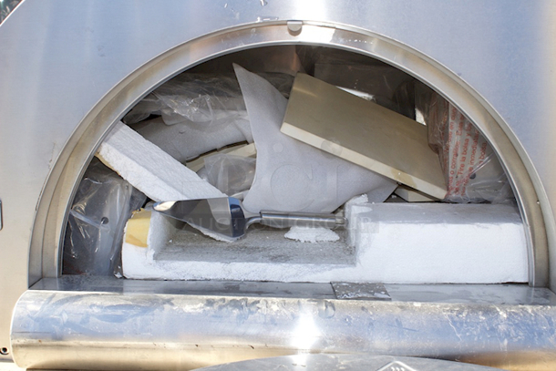 BRAND NEW SCRATCH & DENT! Backyard Pro 31 3/4" Stainless Steel Hybrid Wood / Liquid Propane Outdoor Countertop Pizza Oven - Dented On The Exterior, Missing Scrub Brush, Appears To Be No Damage To the Inside Or Ceramic Tiles.  - Image 8 of 10