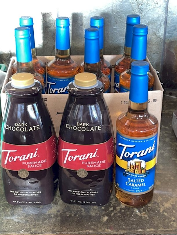 NICE! 2 Unopened 64oz Torani Dark Chocolate Puremade Sauce Bottles and (8) 25oz Torani Salted Caramel Sugar Free Syrup Bottles. 10 Your Bid - Image 1 of 1