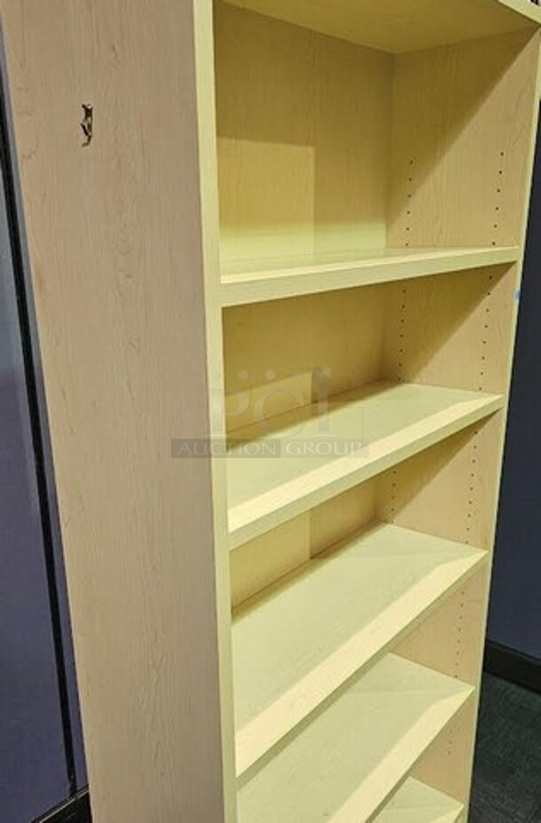 Oak standing bookcase in like-new condition! Has five shelves. 72"H x 36"W x 12"D. 

  - Image 3 of 3