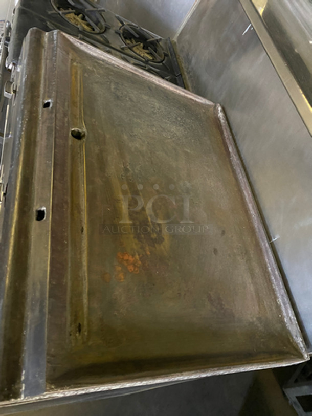 Commercial Natural Gas Powered 4 Burner Stove! With Built In Flat Top Grill! With Back Splash And Salamander Shelf! With Full Size Oven! Metal Oven Rack! With 2 Door Storage Area Underneath! All Stainless Steel! - Image 5 of 12