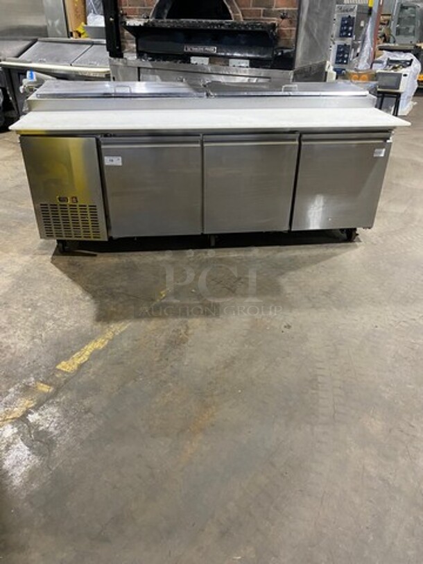 EQ Kitchen Line Commercial Refrigerated Pizza Prep Table! With Commercial Cutting Board! With 3 Door Storage Space! Poly Coated Racks! All Stainless Steel! Model: PICL3 SN: 6455410816102206 115V